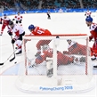 GANGNEUNG, SOUTH KOREA - FEBRUARY 24: Canada's Wojciech Wolski #8 gets the puck past Czech Republic's Pavel Francouz #33 to score a third period goal with Michal Jordan #47 and Tomas Kundratek #84 looking on during bronze medal round action at the PyeongChang 2018 Olympic Winter Games. (Photo by Matt Zambonin/HHOF-IIHF Images)

